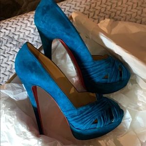Gently used Christian Louboutin turquoise suede